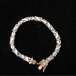 Oval blue topaz bracelet